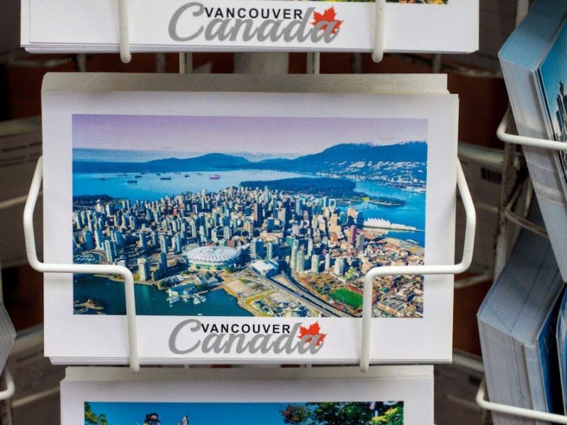 Be a tourist in your own town cover of a postcard from our hometown of Vancouver